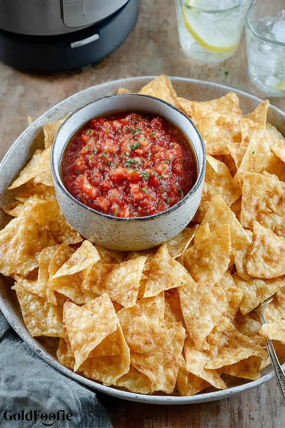 Air Fryer Low Carb Tortilla Crisp low-carb tortilla chips with salsa in a bowl