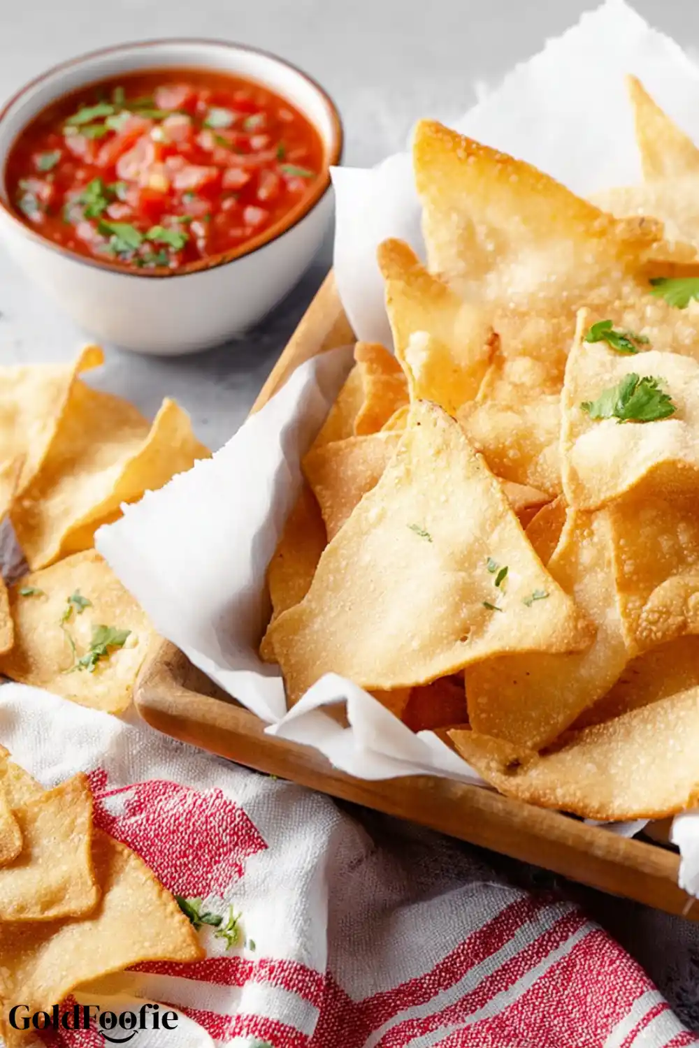 Baked Keto Chips with Salsa Basket of keto tortilla chips with salsa