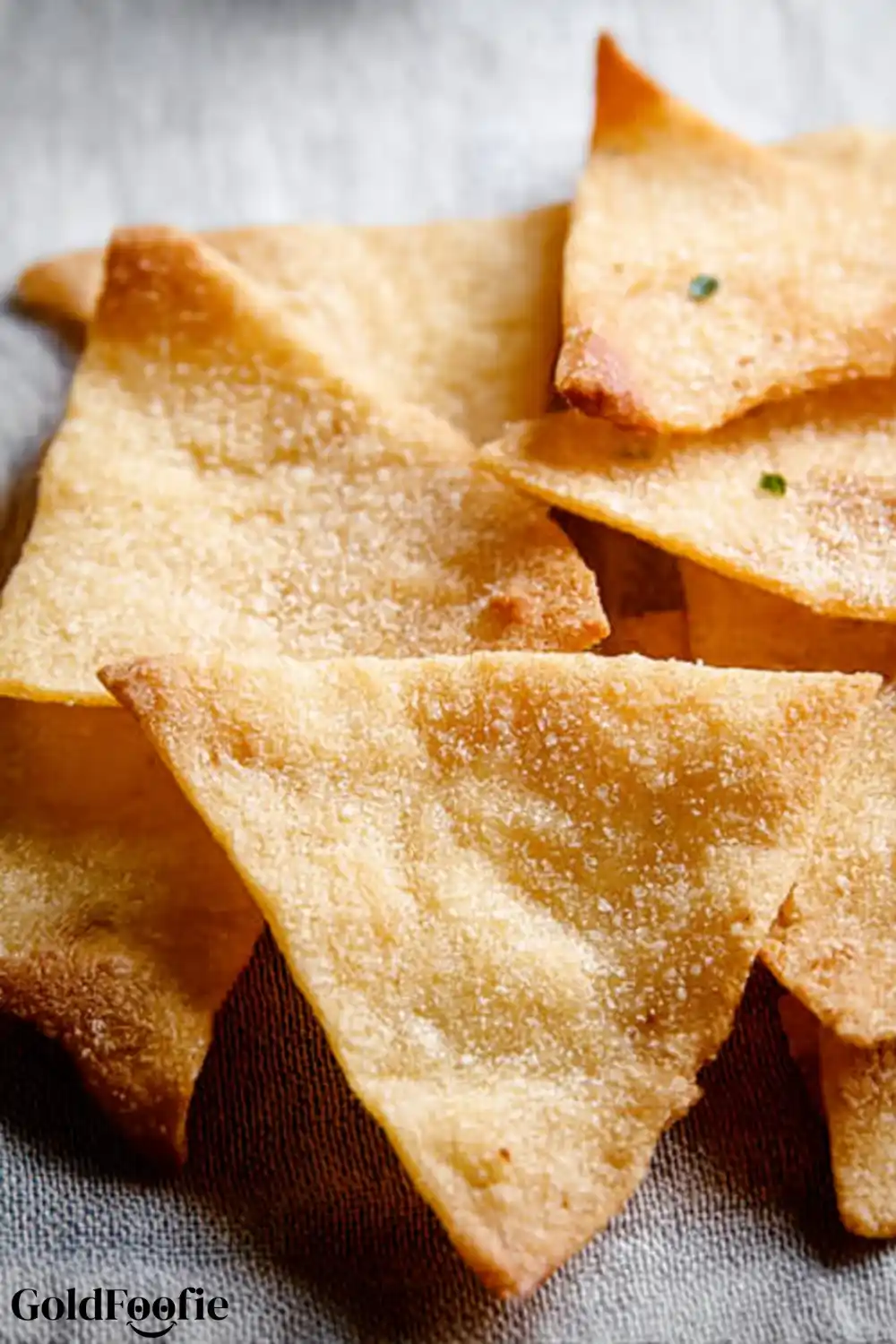 Classic No-Cheese Keto Chips Stack of plain keto chips on fabric
