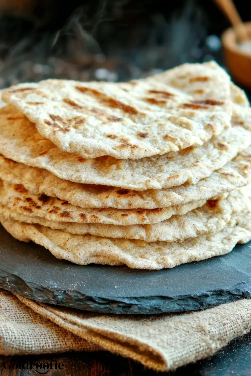 Coconut Flour Tortillas Coconut flour tortillas stacked on a linen towel