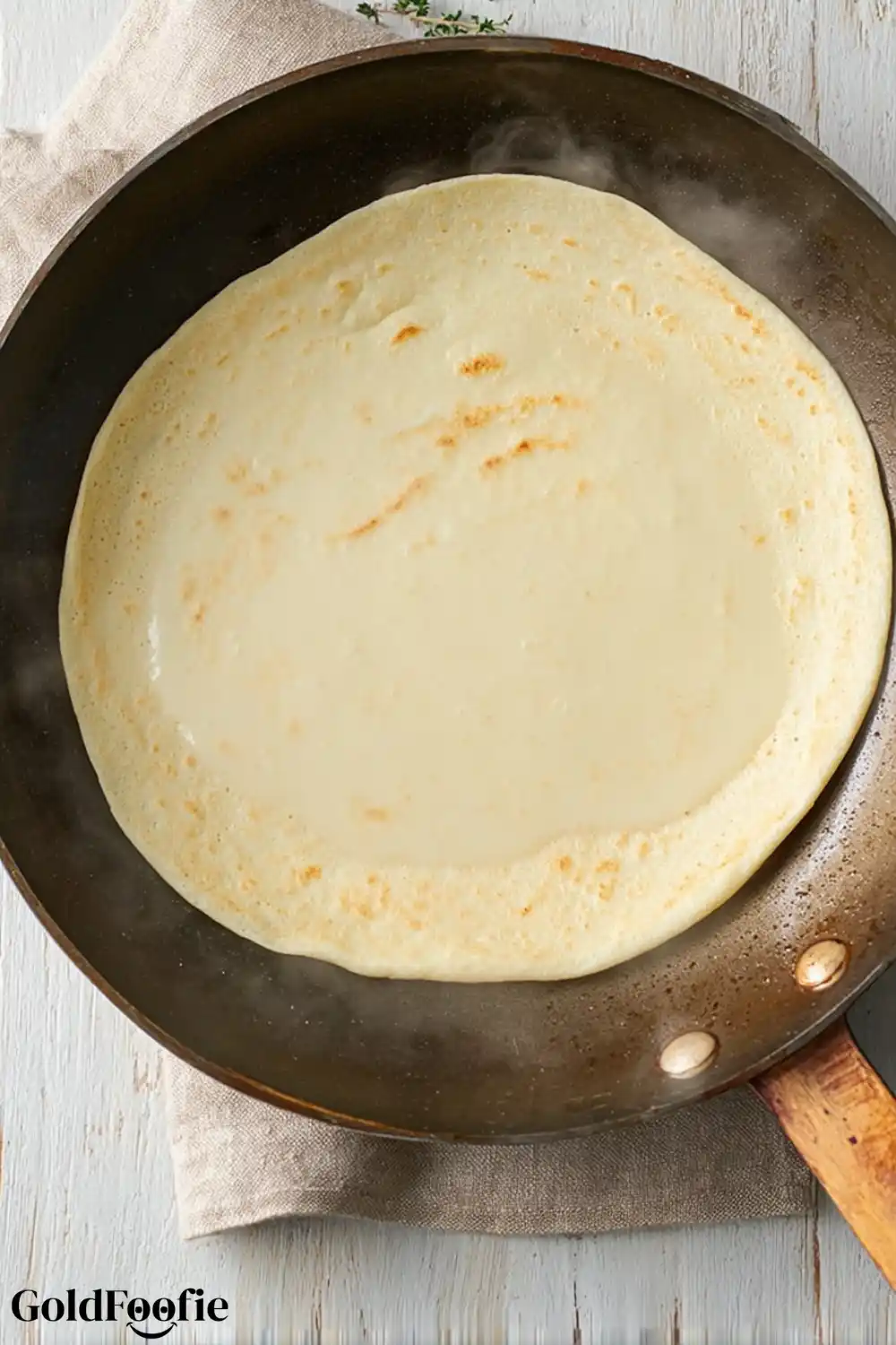 Cooking the Zero-Carb Tortilla in Skillet Tortilla cooking on a nonstick skillet