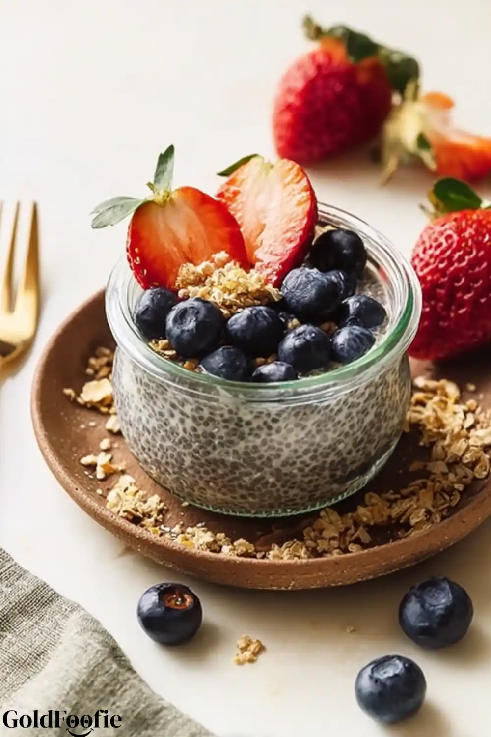 Easy Vanilla Chia Pudding 5 Vanilla chia pudding topped with blueberries, strawberries, and granola