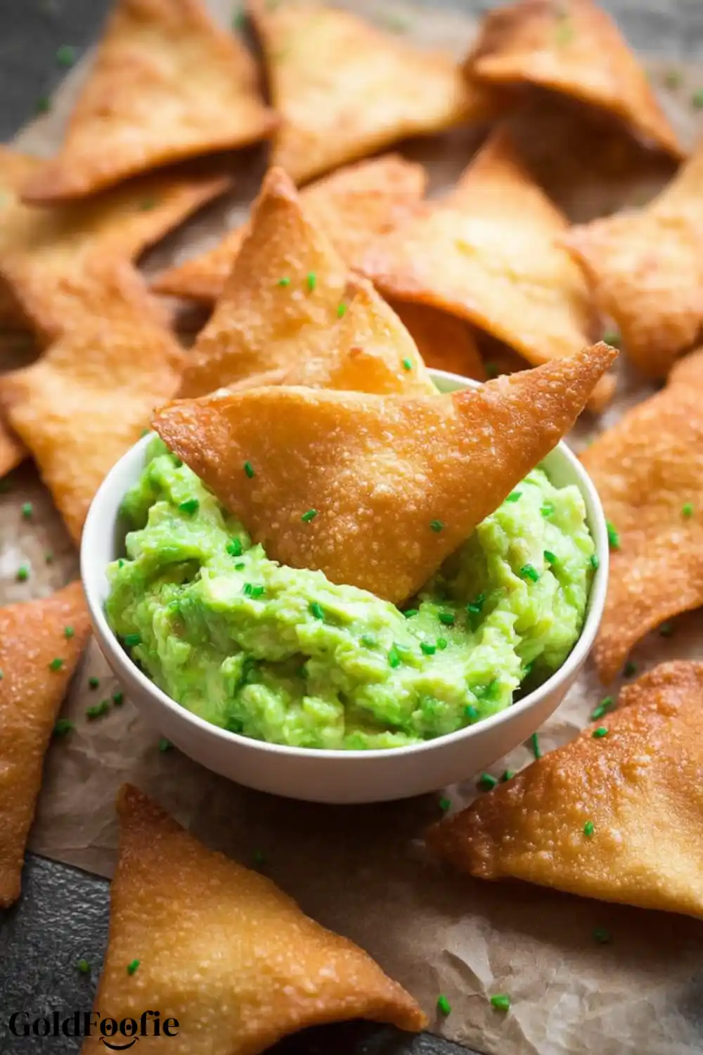 Dippable Keto Chips with Homemade Guacamole Keto chips dipped into guacamole