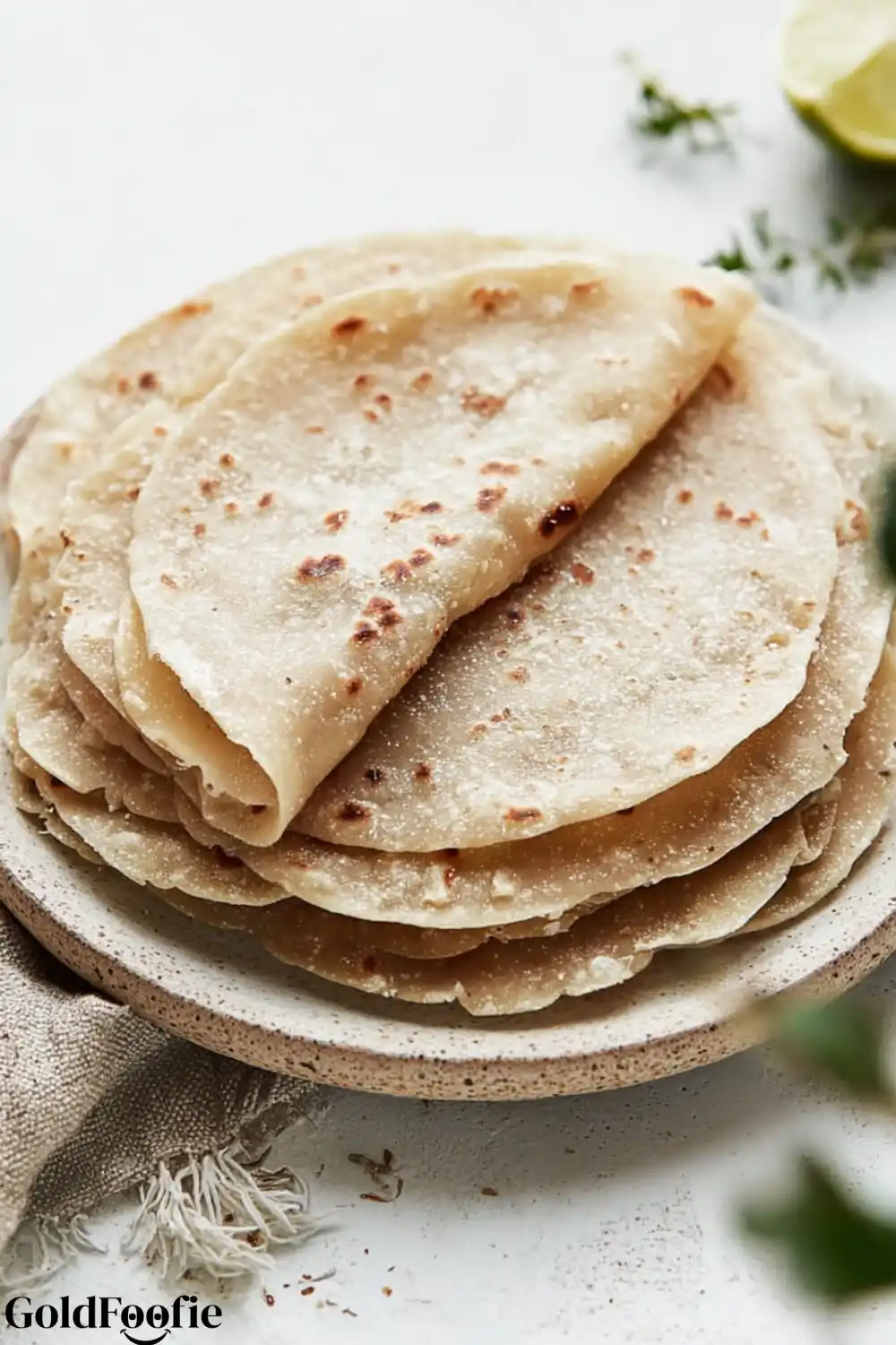 Easy Gluten-Free Tortillas Recipe 6 Close-up of gluten-free tortillas folded and stacked on a plate