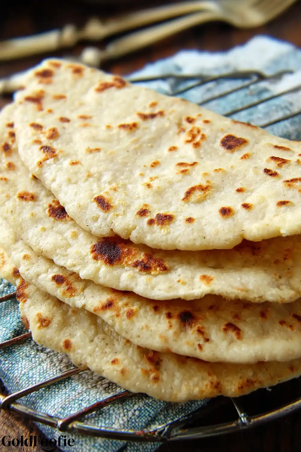 Folded Almond Flour Tortillas – Low Carb and Delicious Multiple almond tortillas folded in half on cloth