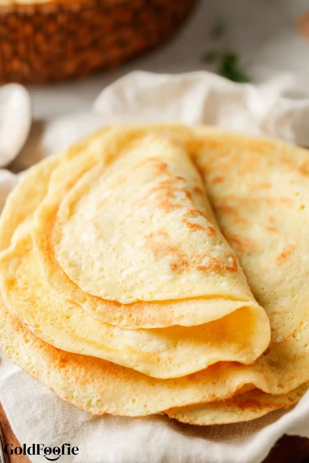 Folded Homemade Tortillas with Golden Finish Folded zero-carb tortillas resting in a basket
