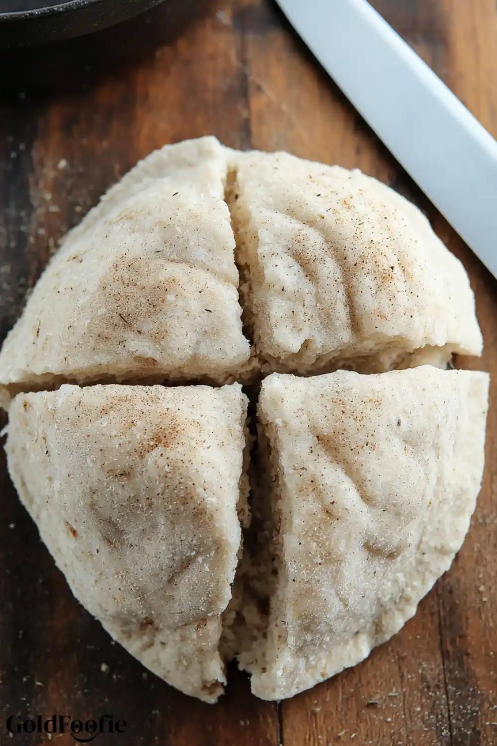 Keto Coconut Flour Tortillas – Easy 2-Ingredient Recipe Vertical stack of low-carb coconut tortillas resting on cloth
