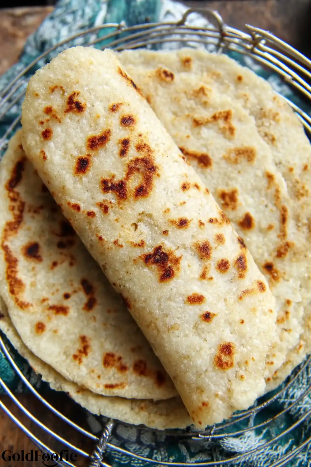 Low-Carb Almond Tortilla on Cooling Rack Almond flour tortillas on rack with golden spots