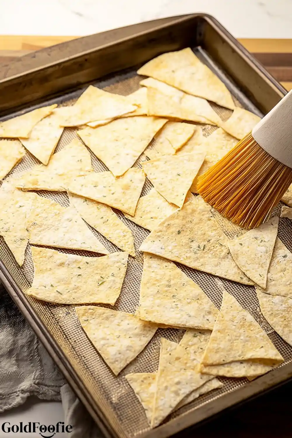 Oil-Brushed Keto Chips Low-carb tortilla chips brushed with oil before baking