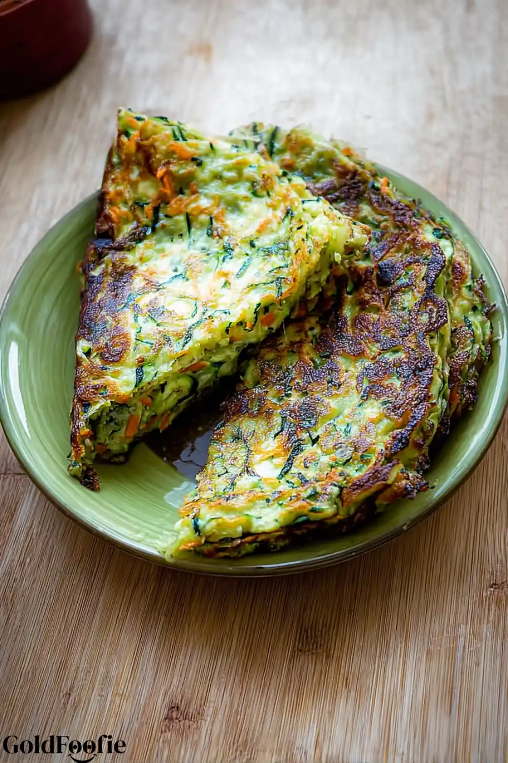 Easy Zucchini Tortillas for Low-Carb Meals 6 Golden zucchini tortillas with carrots on green plate