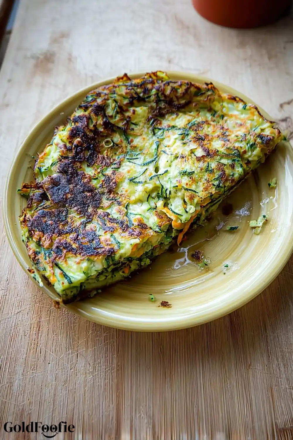 Zucchini Tortillas Thick zucchini-based tortilla sliced on a plate