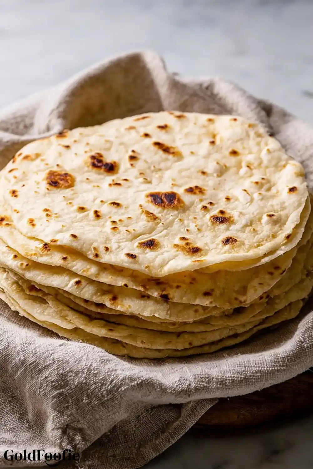 gluten-free tortillas Assorted gluten-free and low-carb tortillas on white marble