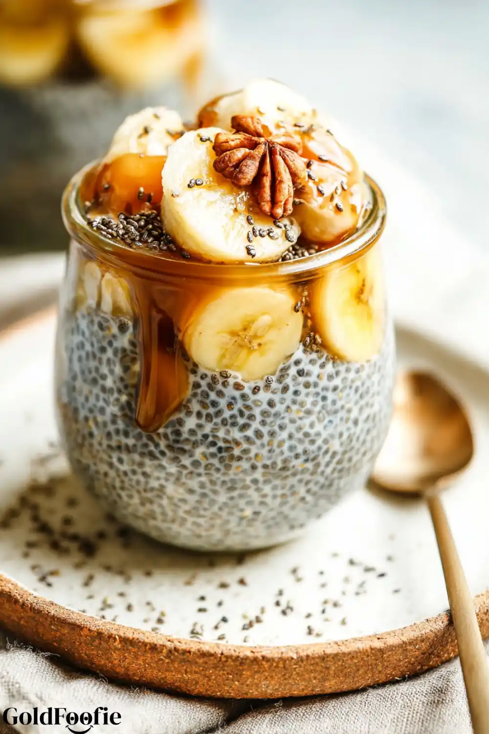 Banana Chia Pudding 5 Banana chia pudding topped with pecans, syrup, and banana slices