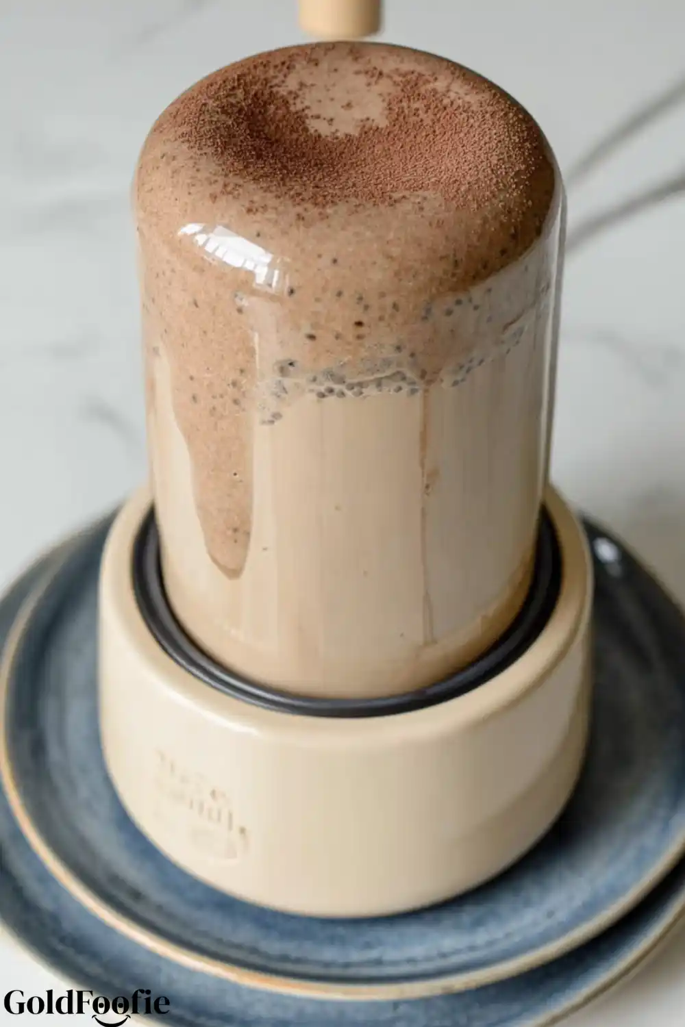 Blending the Tiramisu Chia Pudding Mix Blended chia pudding in upside-down blender