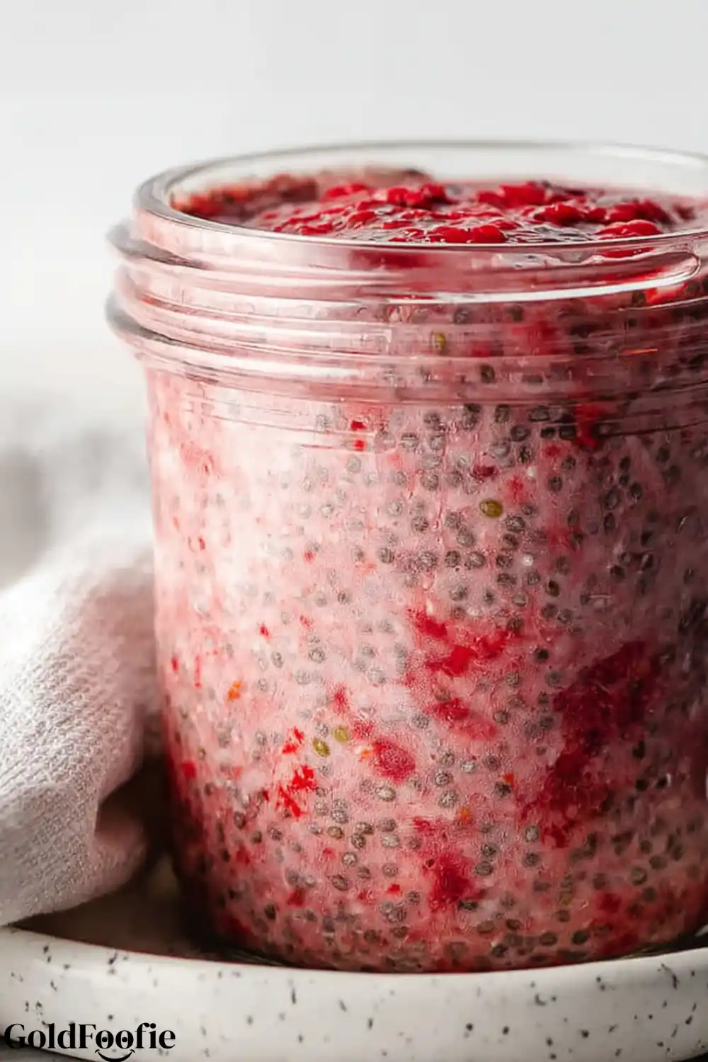 Chilled Raspberry Chia Jar Thick raspberry chia pudding set in a jar