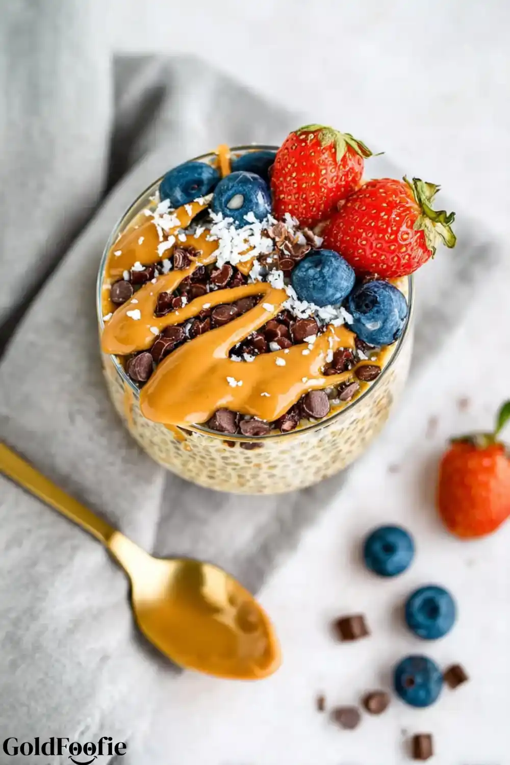 Chocolate Peanut Butter Chia Bowl Chia pudding with strawberries, coconut, and chocolate chips