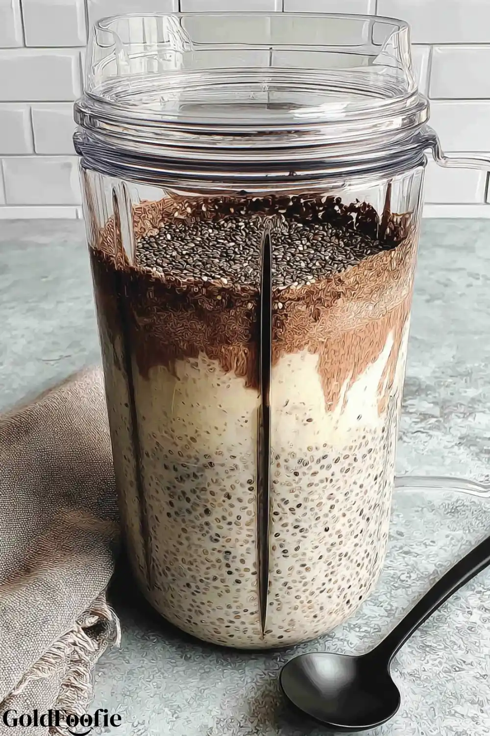 Cocoa Chia in Blender Chia pudding and cocoa powder in a blender