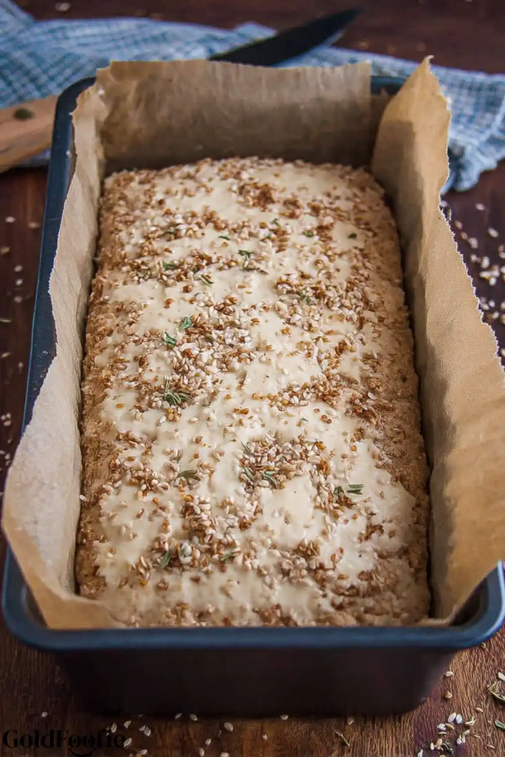 Coconut Flour Bread Batter Before Baking Raw coconut flour bread batter in a loaf pan, ready to be baked.