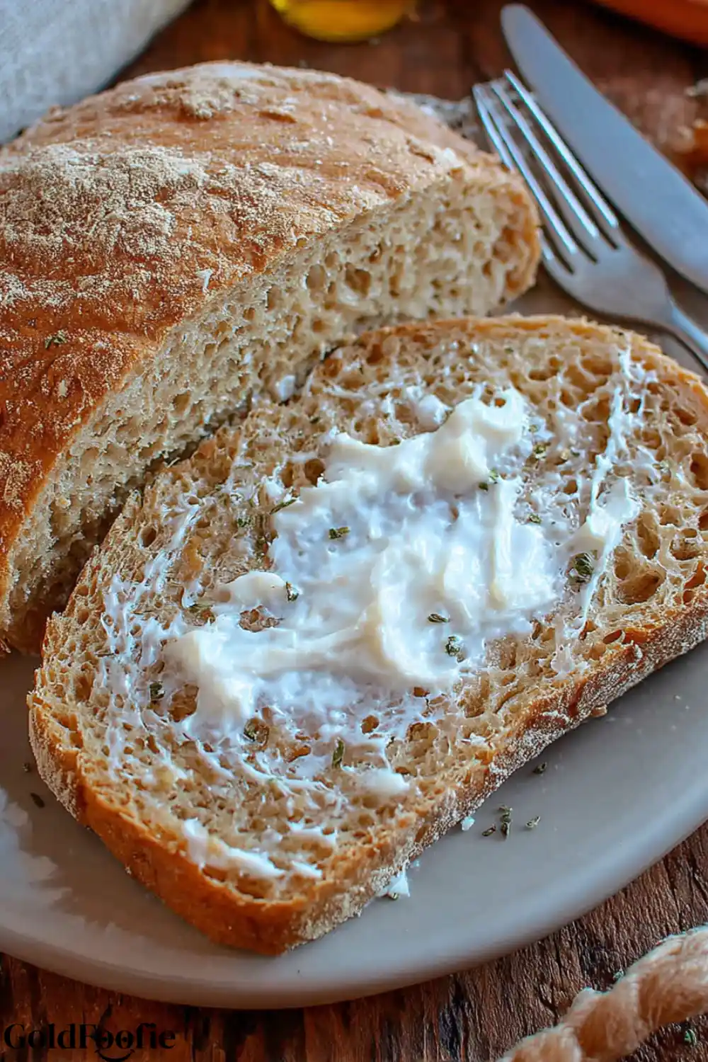 Hearty Bread Slice A close-up of a buttered slice of low-carb bread machine