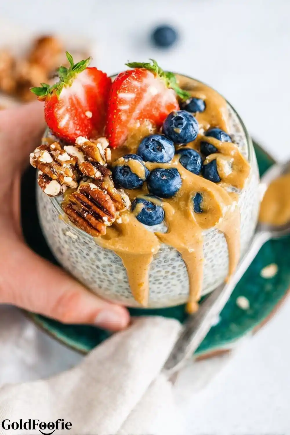 Easy Peanut Butter Chia Pudding in Minutes 5 Chia pudding topped with peanut butter, berries, and nuts