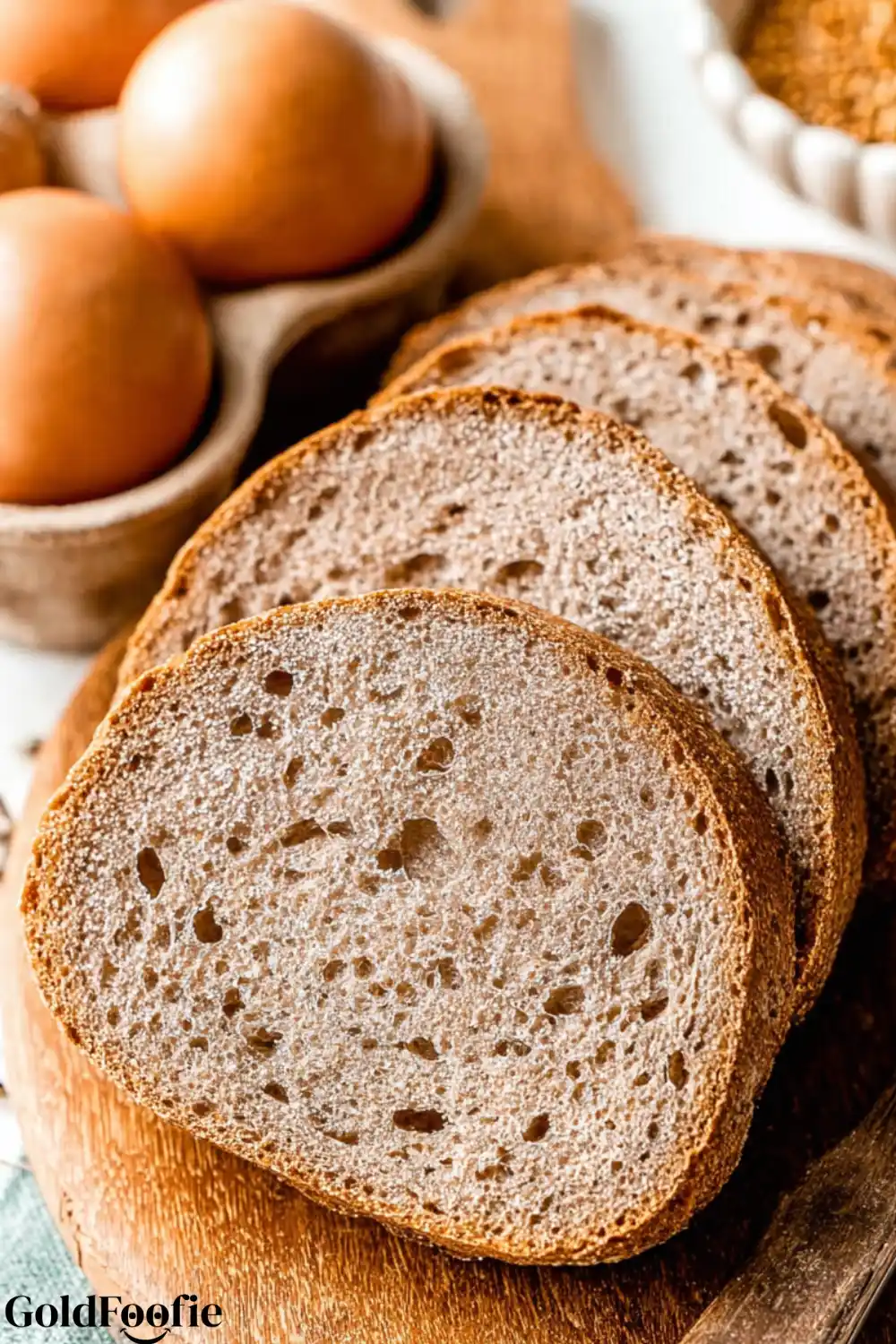Keto Bread Texture A close-up of four thick slices of low-carb bread showing the airy texture.