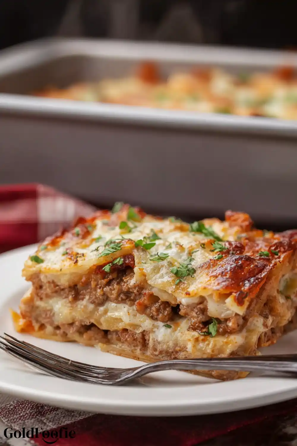 Low Carb Lasagna Plated and Garnished Plated low carb tortilla lasagna slice
