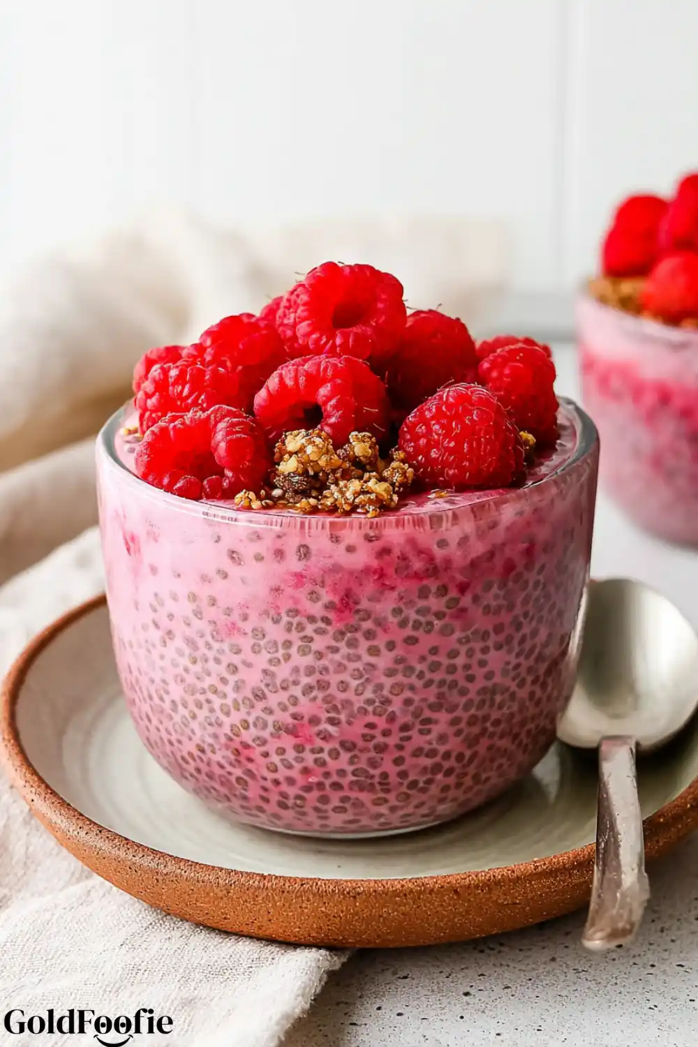 Raspberry Chia Pudding 5 Raspberry chia pudding with plump berries and golden granola