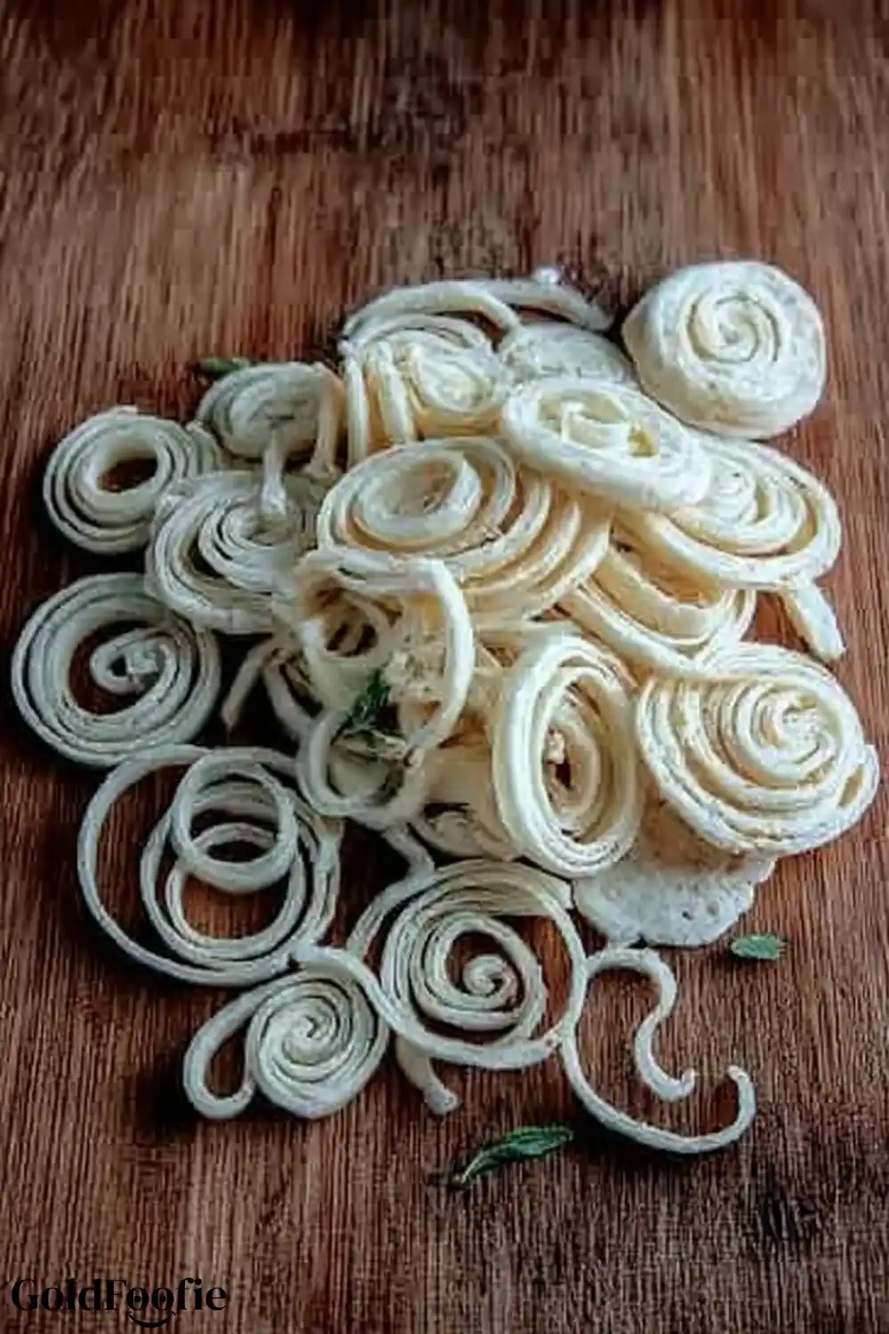 Rolled and Cut Low Carb Tortilla Strips Rolled tortilla strips sliced into spiral shapes