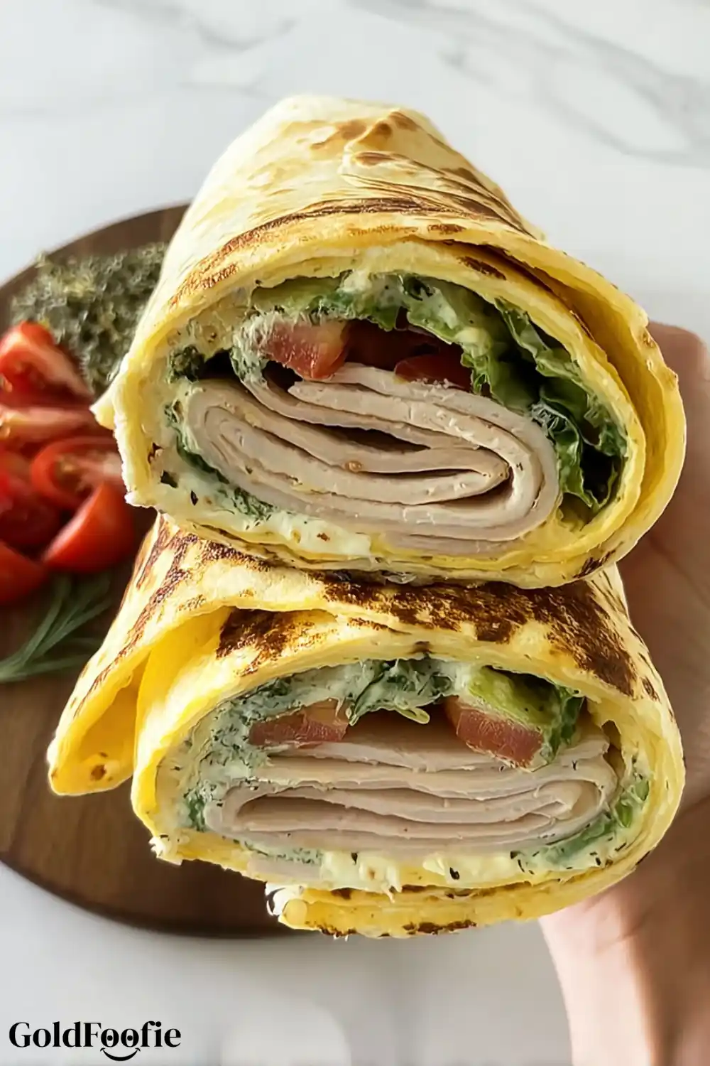 Cheese-Based Wraps for Keto & Gluten-Free Meals 6 Cheese-based wrap with turkey, tomato, and lettuce, rolled