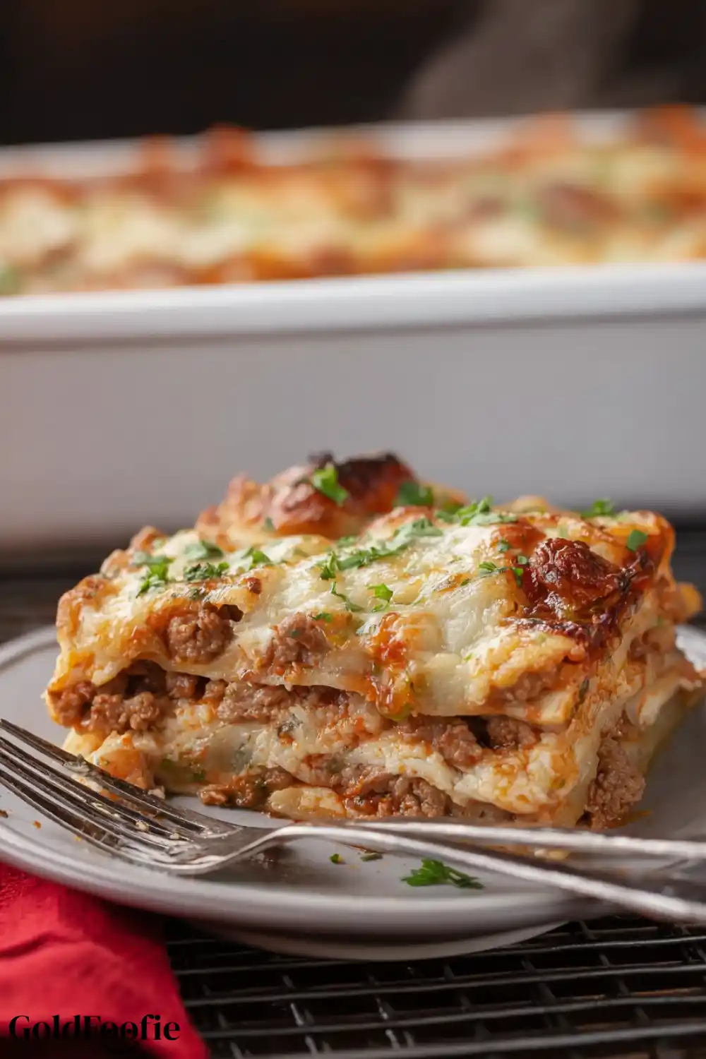 Easy Low Carb Tortilla Lasagna Recipe 6 Slice of low carb tortilla lasagna served on a gray plate