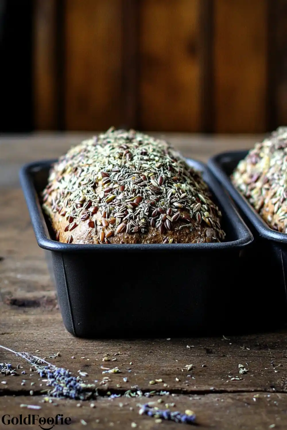 Sprouted Loaf in Pan Sprouted grain bread in a pan topped with fennel and flax