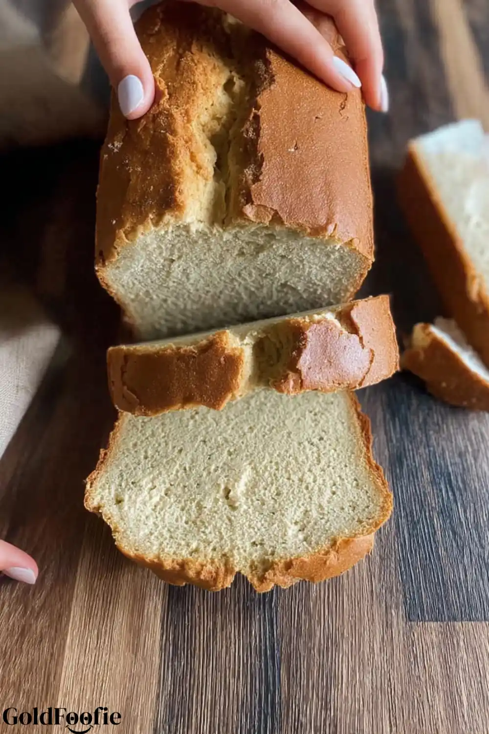 Almond Flour Bread Perfection Light Moist and Low Carb 5 A soft slice of almond flour bread topped with melting butter.