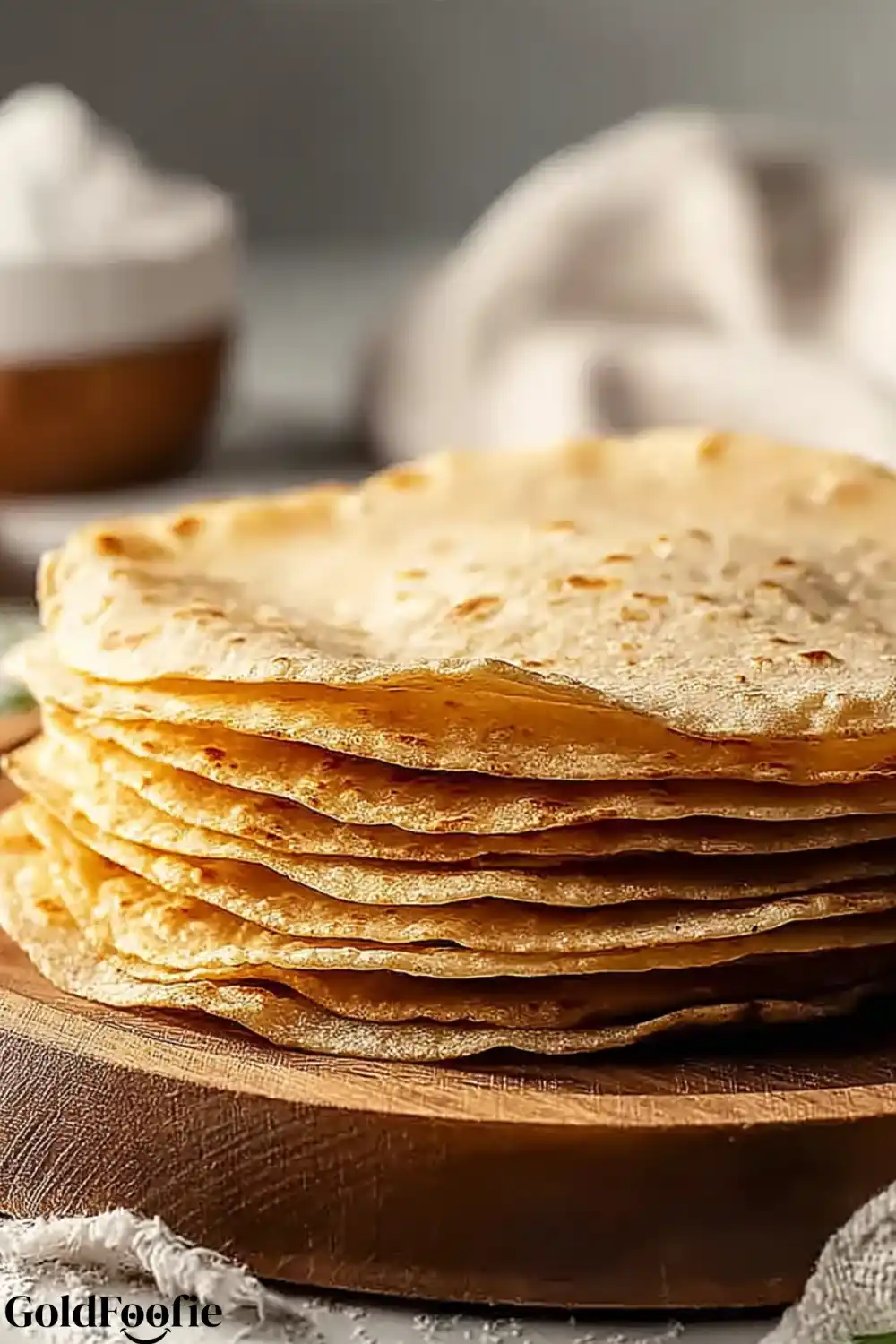 oat and bread tortilla recipes. Stack of golden tortillas on a wooden board