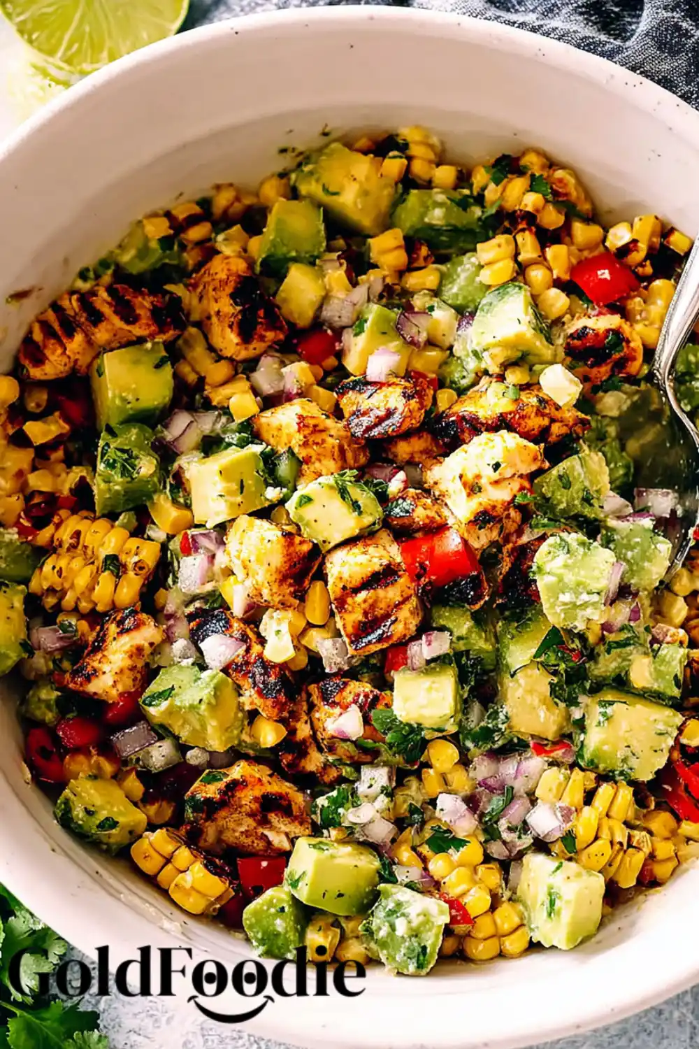 Avocado Corn Salsa Bowl of avocado corn salsa with grilled chicken