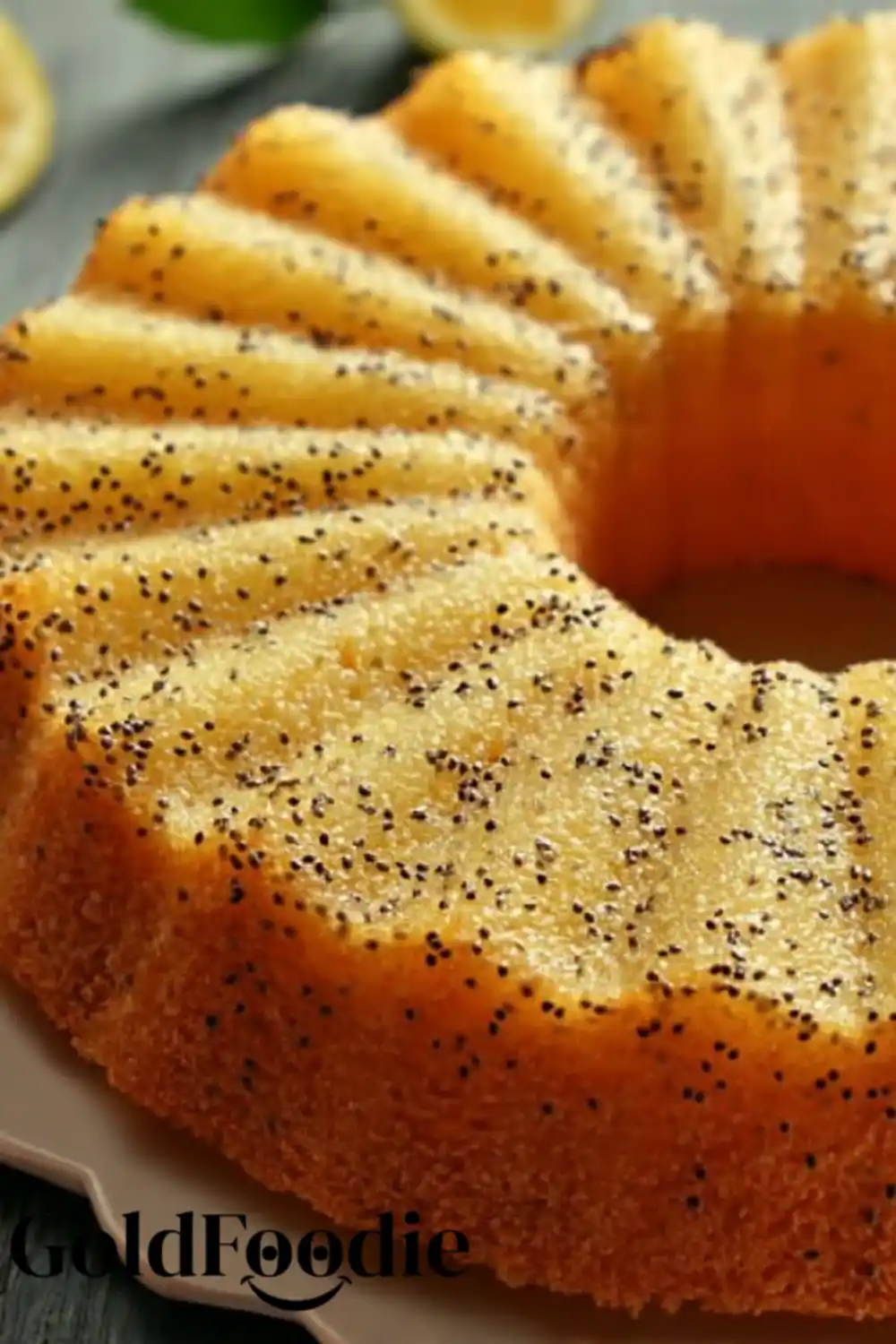 Cake Texture Close-Up Zoomed-in view of orange chia cake showing fluffy crumb and seed texture.