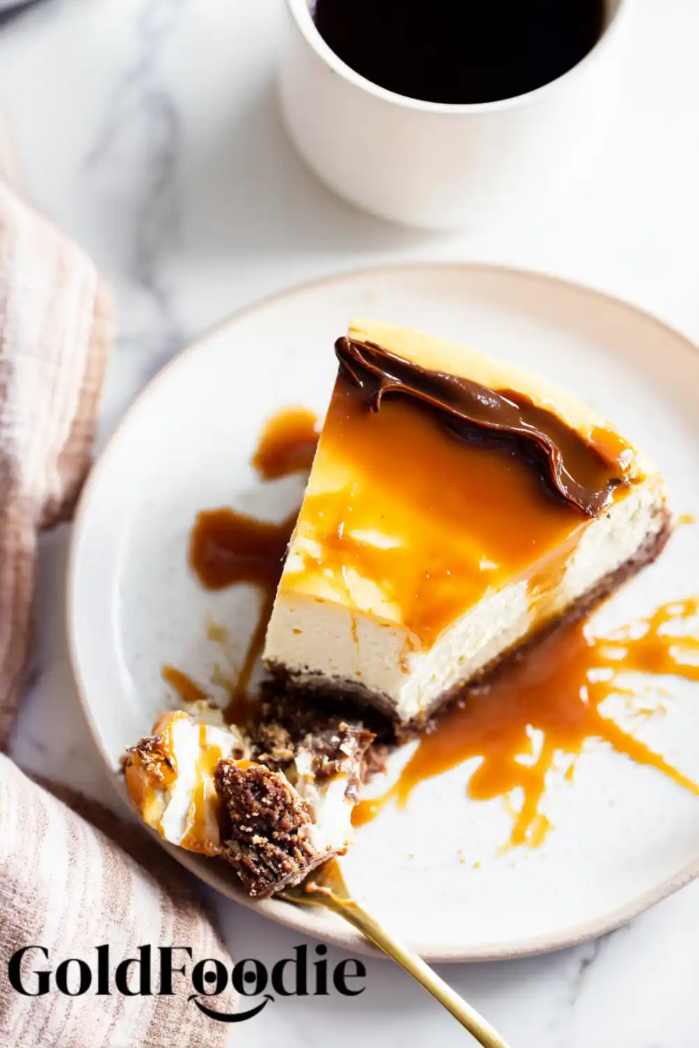 Caramel Drizzled Cheesecake Cheesecake slice with thick caramel sauce