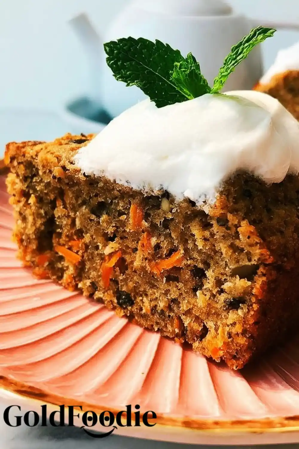 Carrot Chia Cake Snack Slice Carrot chia cake slice on pink plate with creamy topping