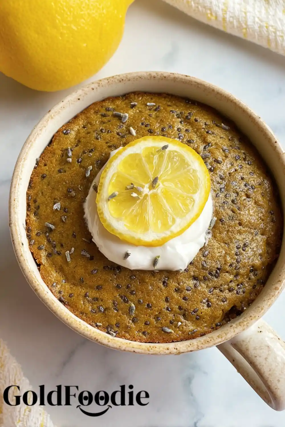 Chia Cake with Lemon Chia seed mug cake topped with lemon slice and lavender