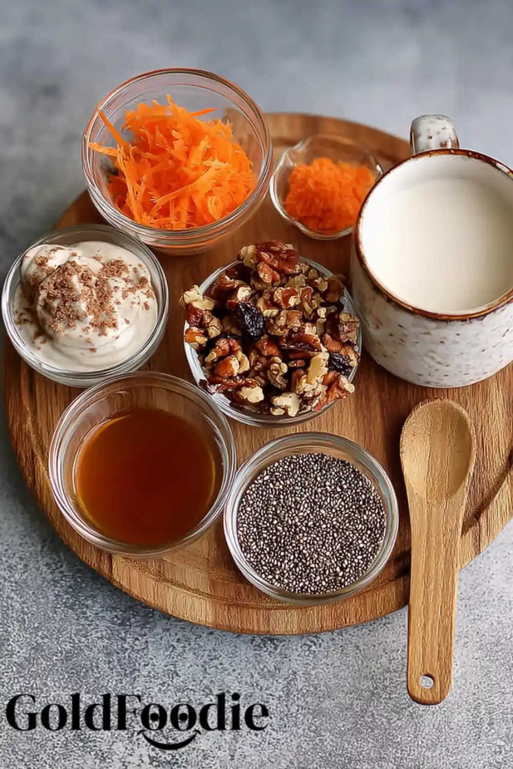 Chia Pudding Prep Board Ingredients for Carrot Cake Chia pudding on a wooden board, including milk, chia, walnuts, syrup, and carrots.