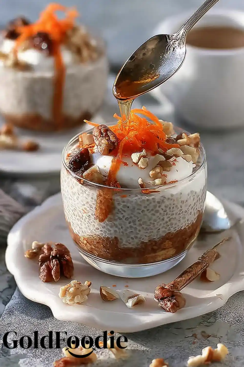 Classic Carrot Chia Jar Elegant Carrot Cake Chia pudding with caramel topping, mint, whipped yogurt, and floral garnish.