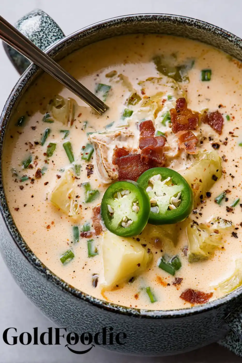 Creamy Soup with Bacon and Jalapenos Soup with bacon, potatoes, and jalapeno garnish