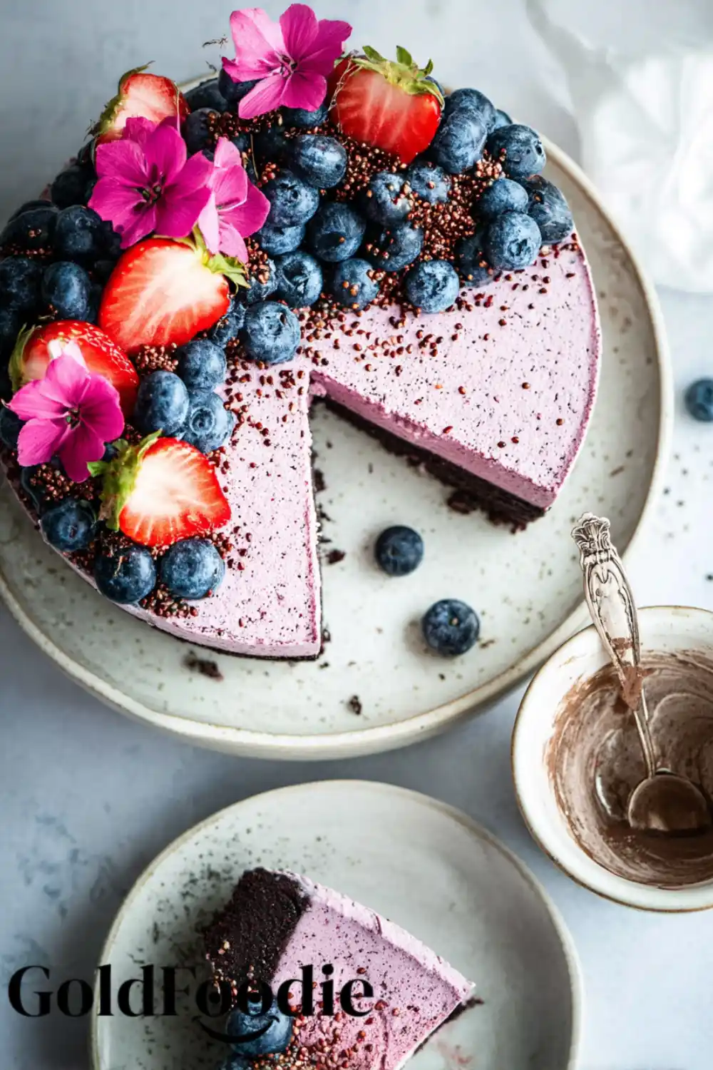 Decorative Chia Cake Decorated chia seed cake gluten free with fruit and flower toppings.