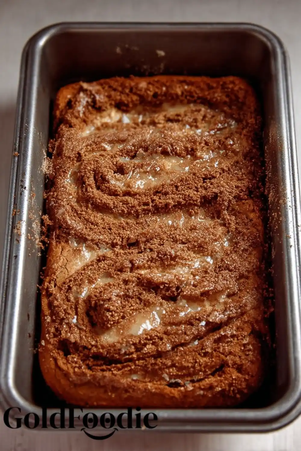 Fresh Cinnamon Swirl Loaf Cinnamon swirl bread in loaf pan.