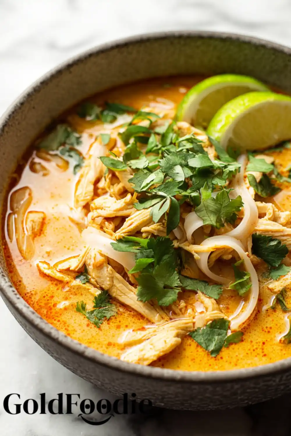 Fresh Herb Garnish Thai chicken soup topped with cilantro and broth