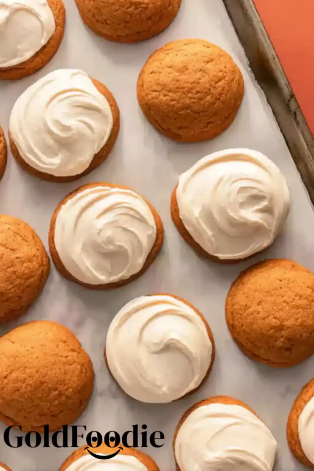 Freshly Baked Pumpkin Cookies Pumpkin cookies cooling on a baking tray