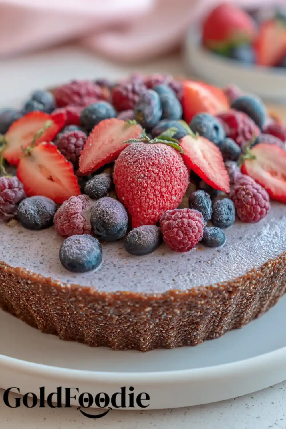 Frozen Berry Vegan Chia Cake Vegan chia seed cake topped with frozen mixed berries