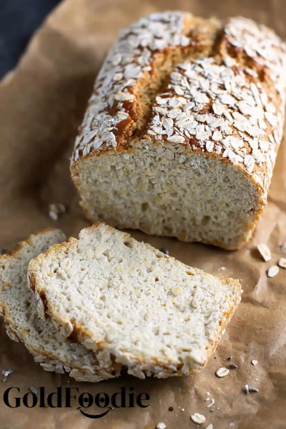 Gluten-Free Vegan Oatmeal Bread 5 A loaf of oatmeal bread with two slices cut.