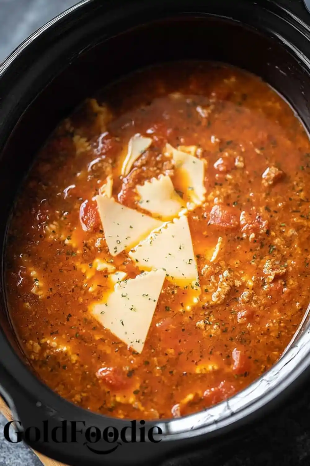 Lasagna Soup Ready to Serve Cooked lasagna soup in crock pot with lasagna noodle pieces