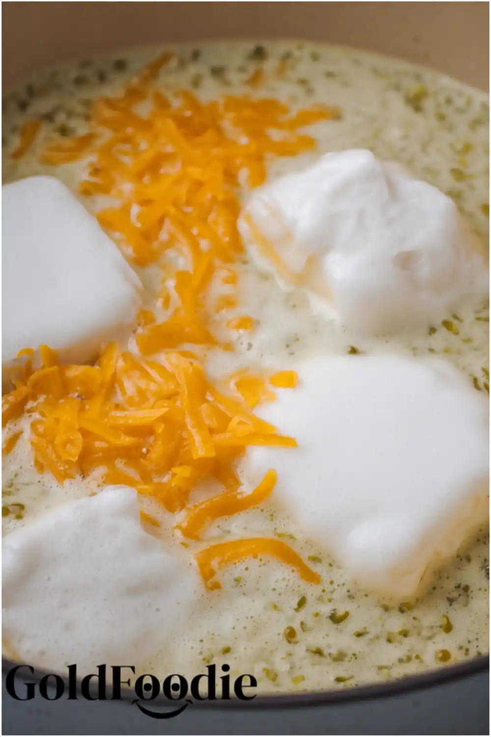 Melting Cheese in Jalapeno Popper Soup Cream cheese and cheddar melting in soup