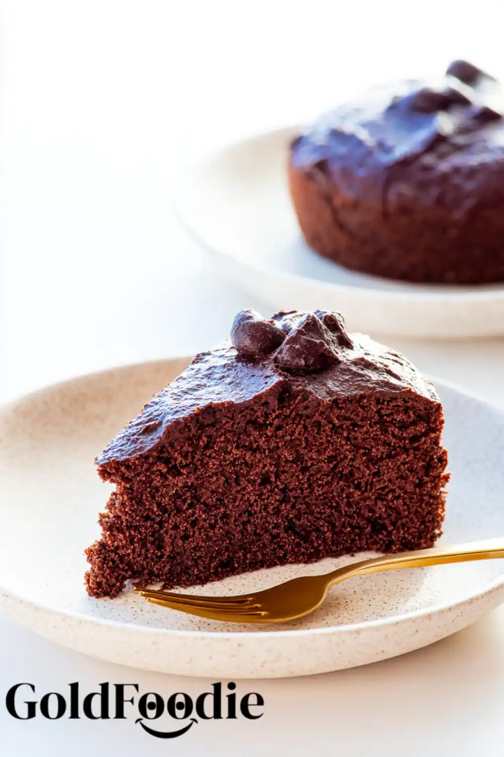 Protein Chocolate Cake Slice with Chips Chocolate chia cake slice with thick frosting and chocolate chips